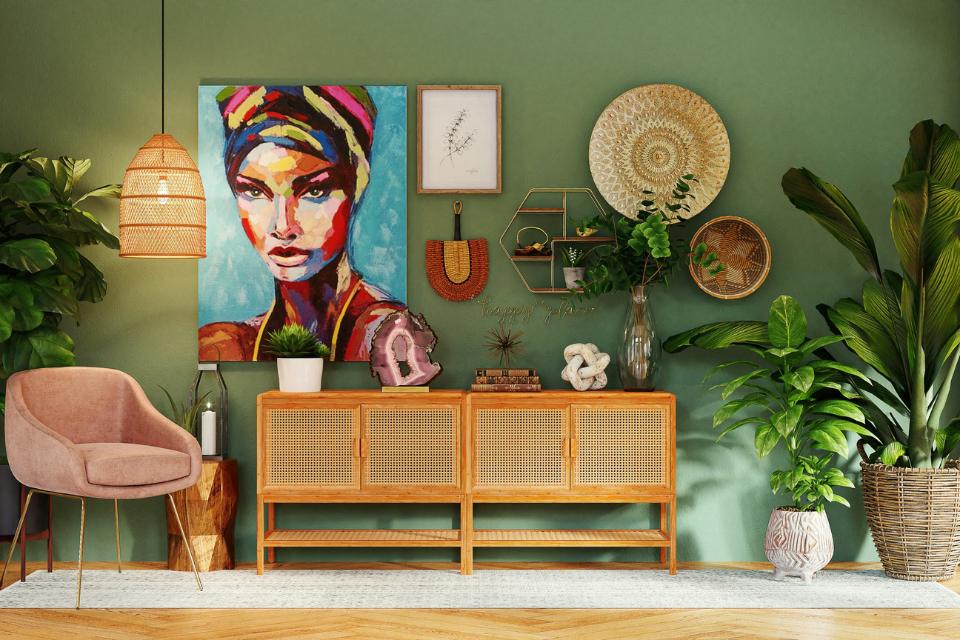 warm wood floors in entryway with maximalist decor.